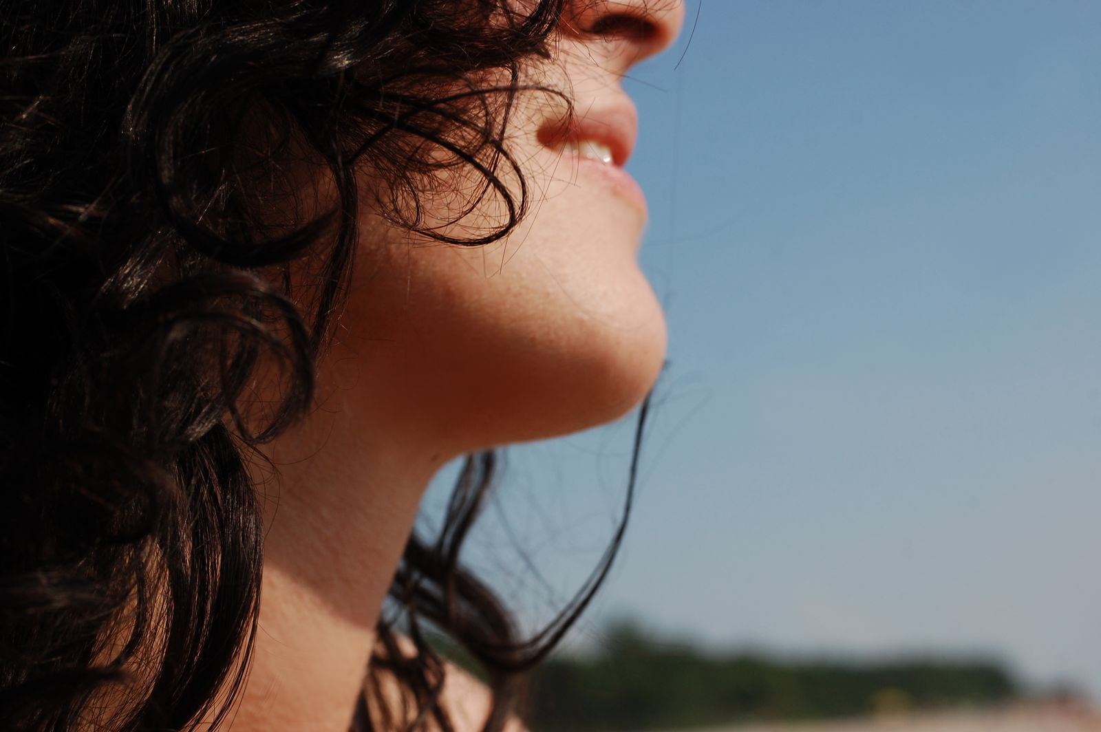 Instagram post: curls against a blue sky