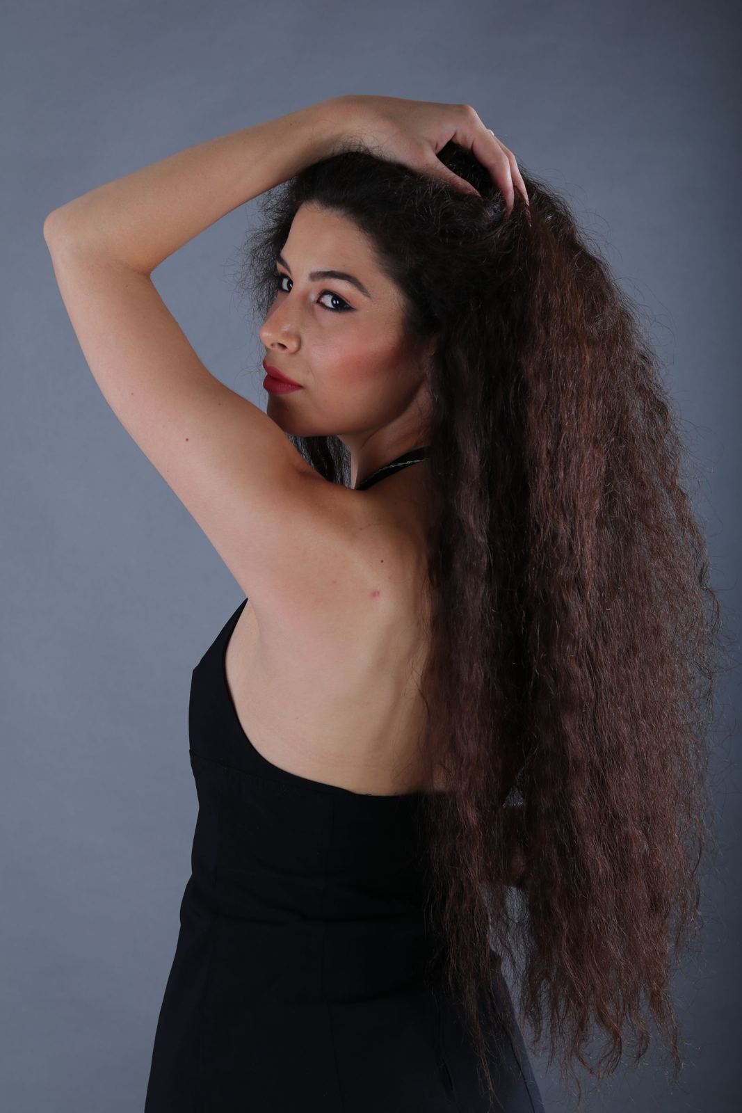 Waist-length curly hair after hydration ritual
