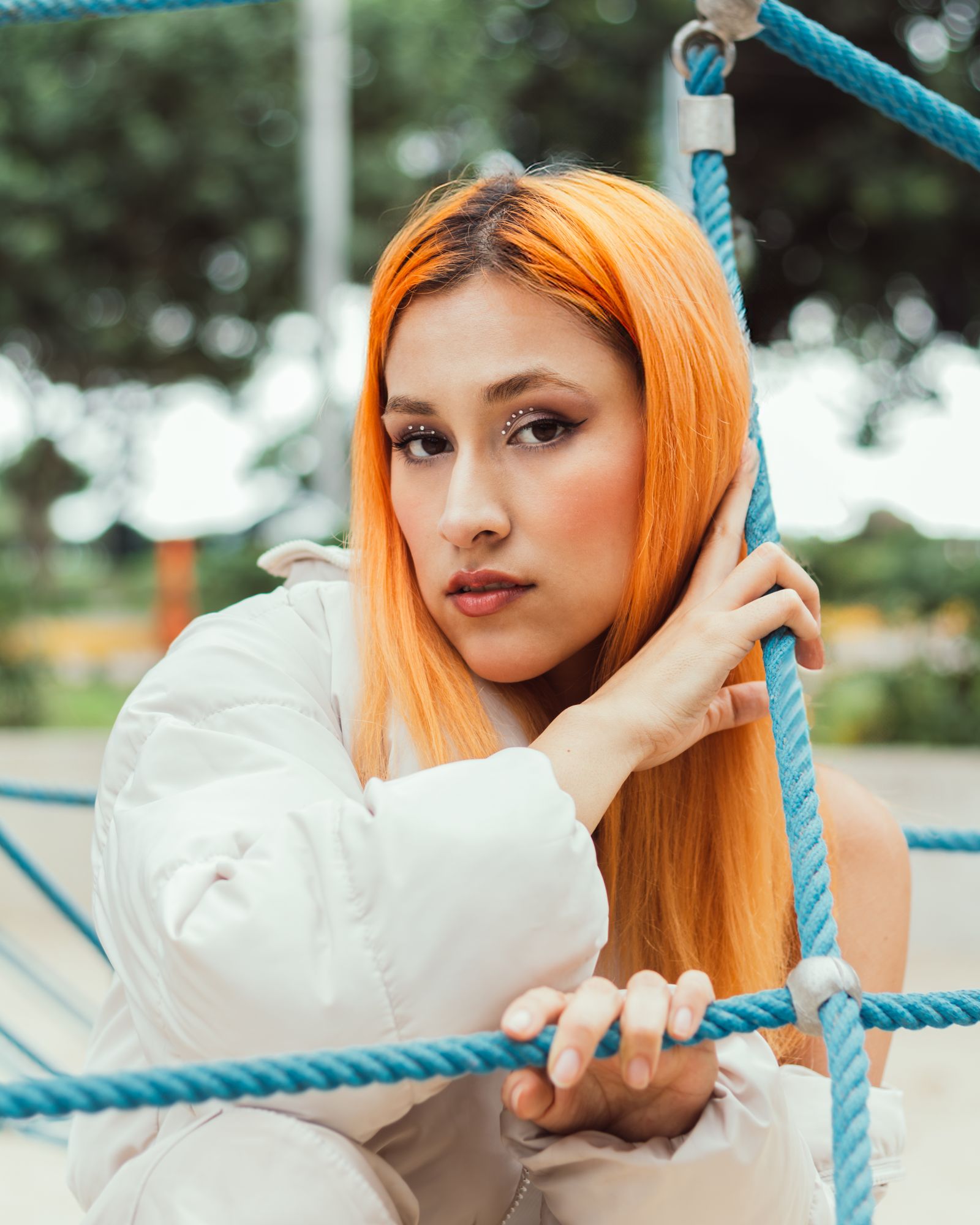 Woman with bright tangerine hair