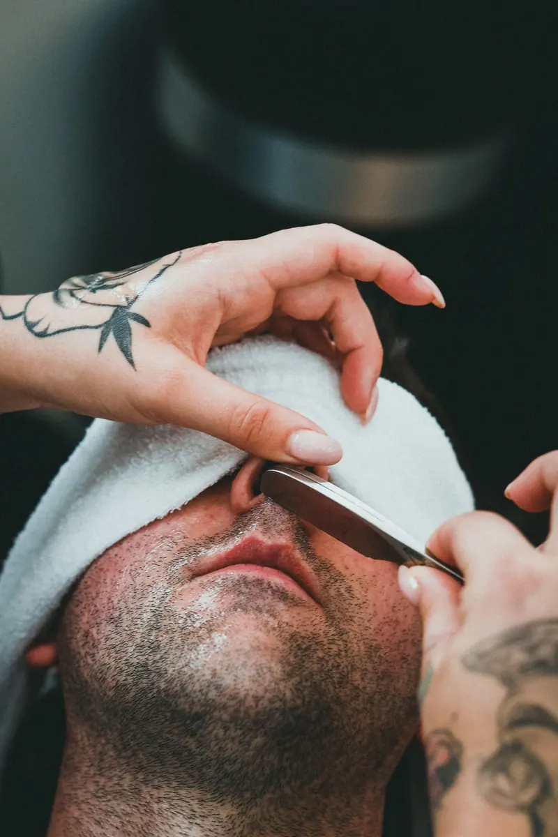 Hot towel over a client's face