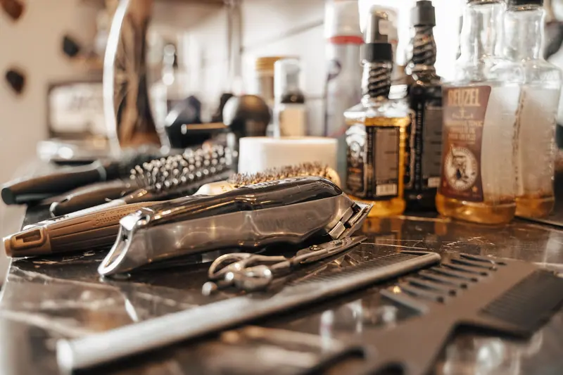 Bourbon bottles and grooming tools on the bar