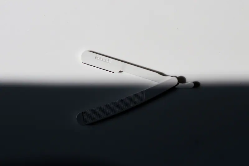 Barber tools in a dark drawer
