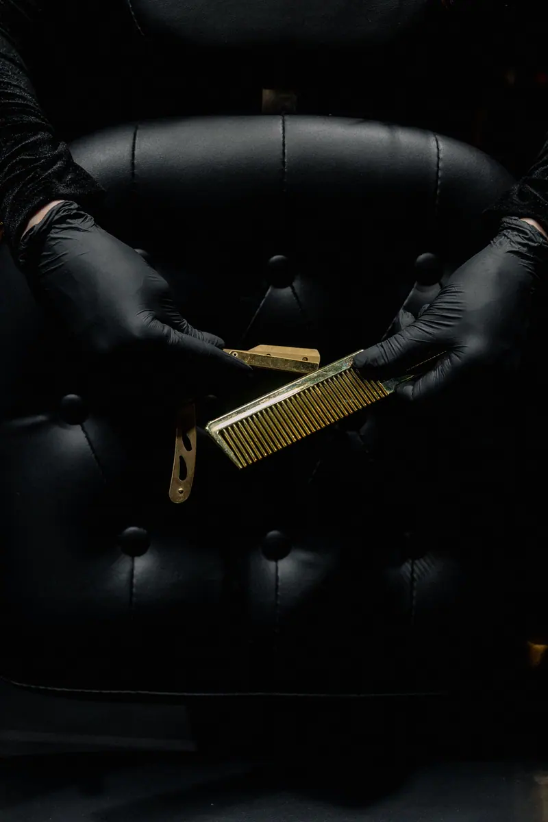 Gold clippers in a dark case