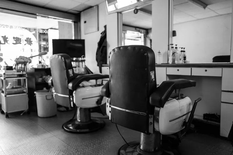 Barber chair in a warm-lit shop