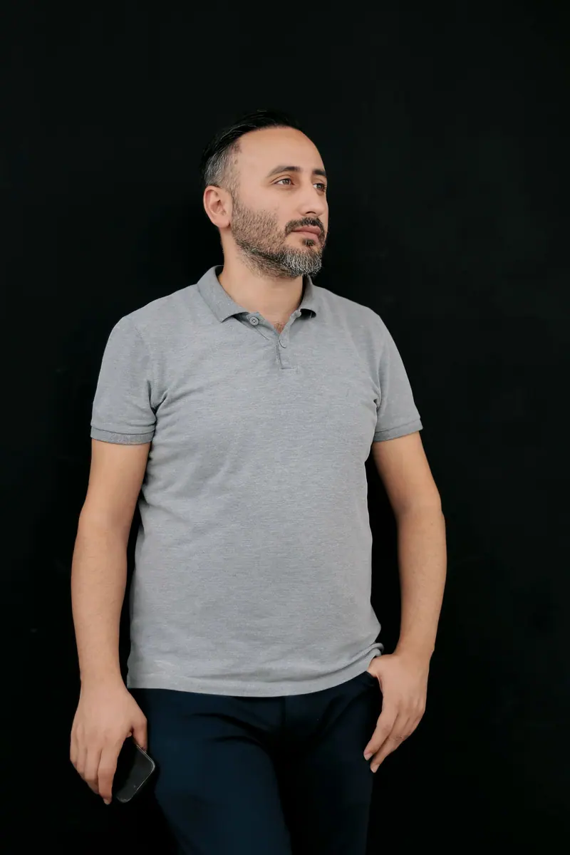 Marco DeLuca, Senior barber