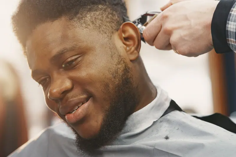 Smiling client during a fade