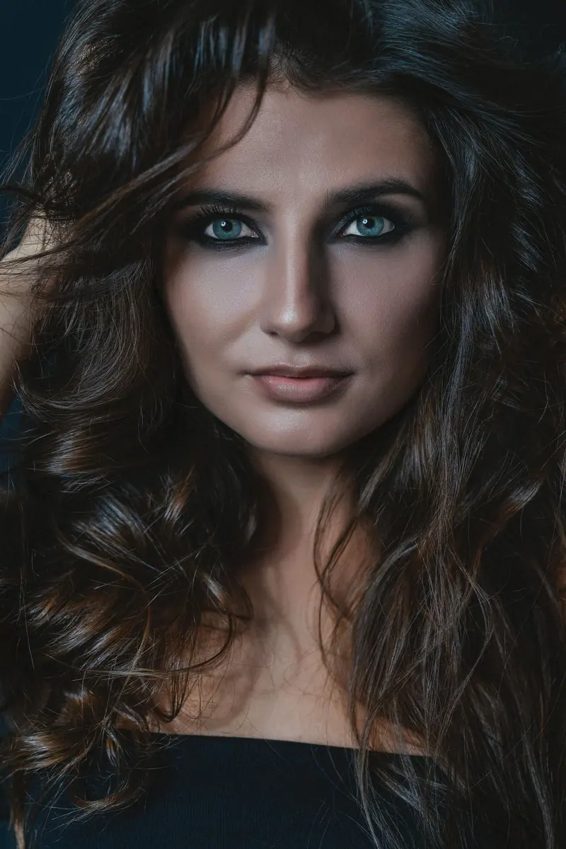 Big brunette volume, close portrait