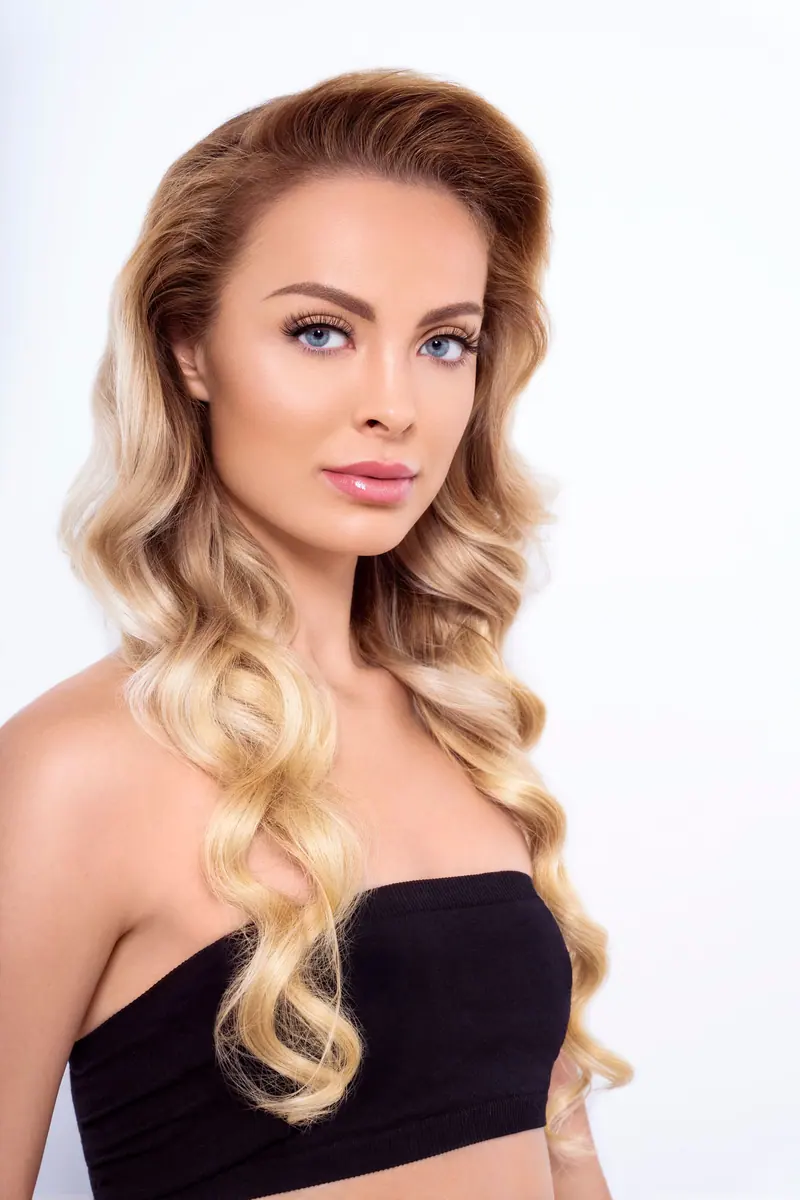 Soft blonde waves on white