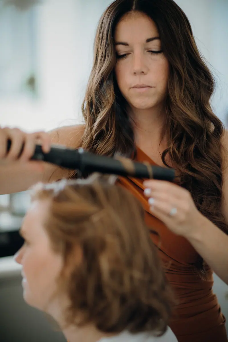 Curling long brunette hair