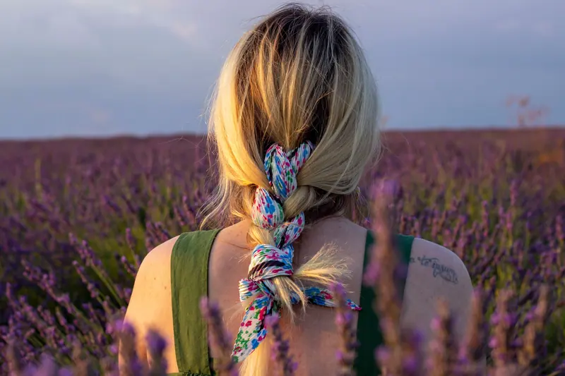 Braided blonde lengths among lavender