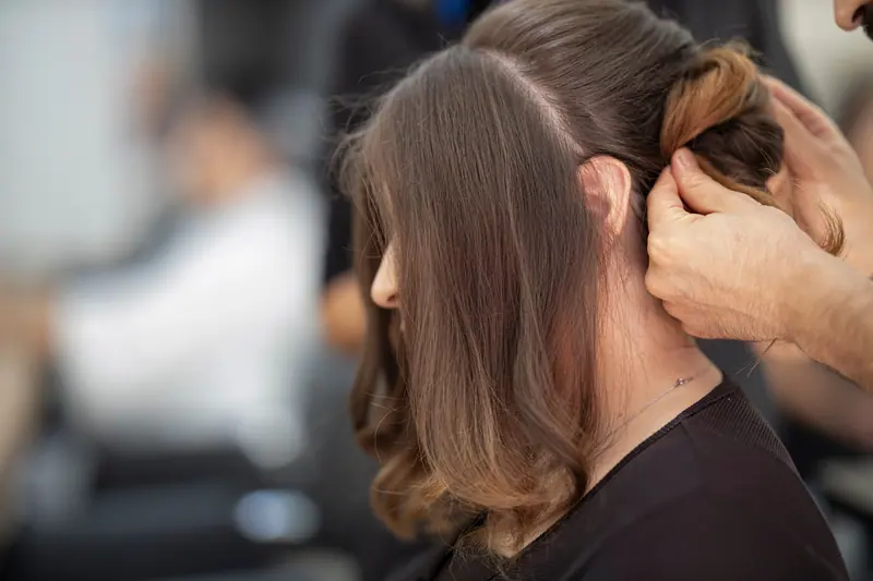 Glossy brunette waves in soft light