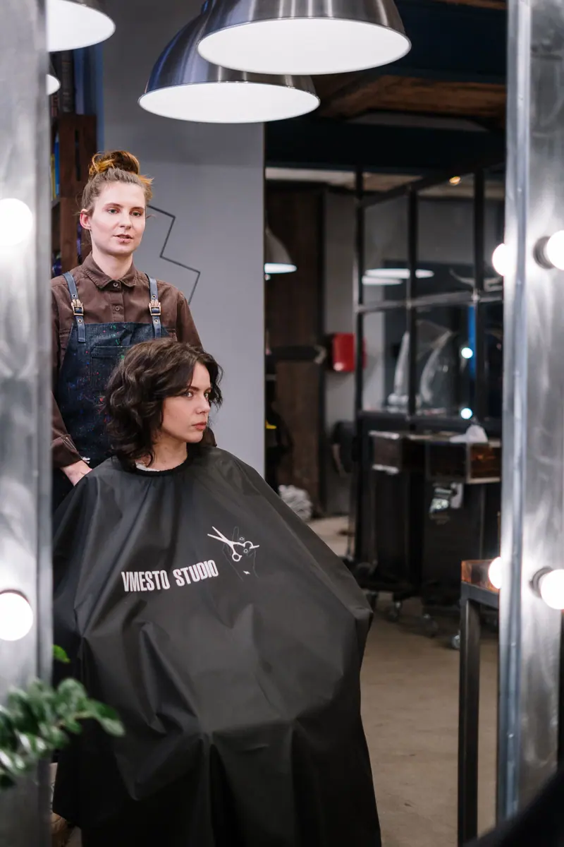 Stylist finishing a client