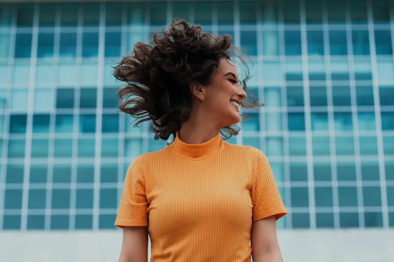 Hair flip on a city street