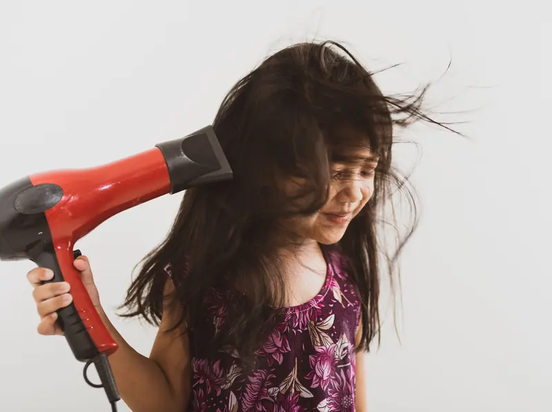Hair dryer and a big smile