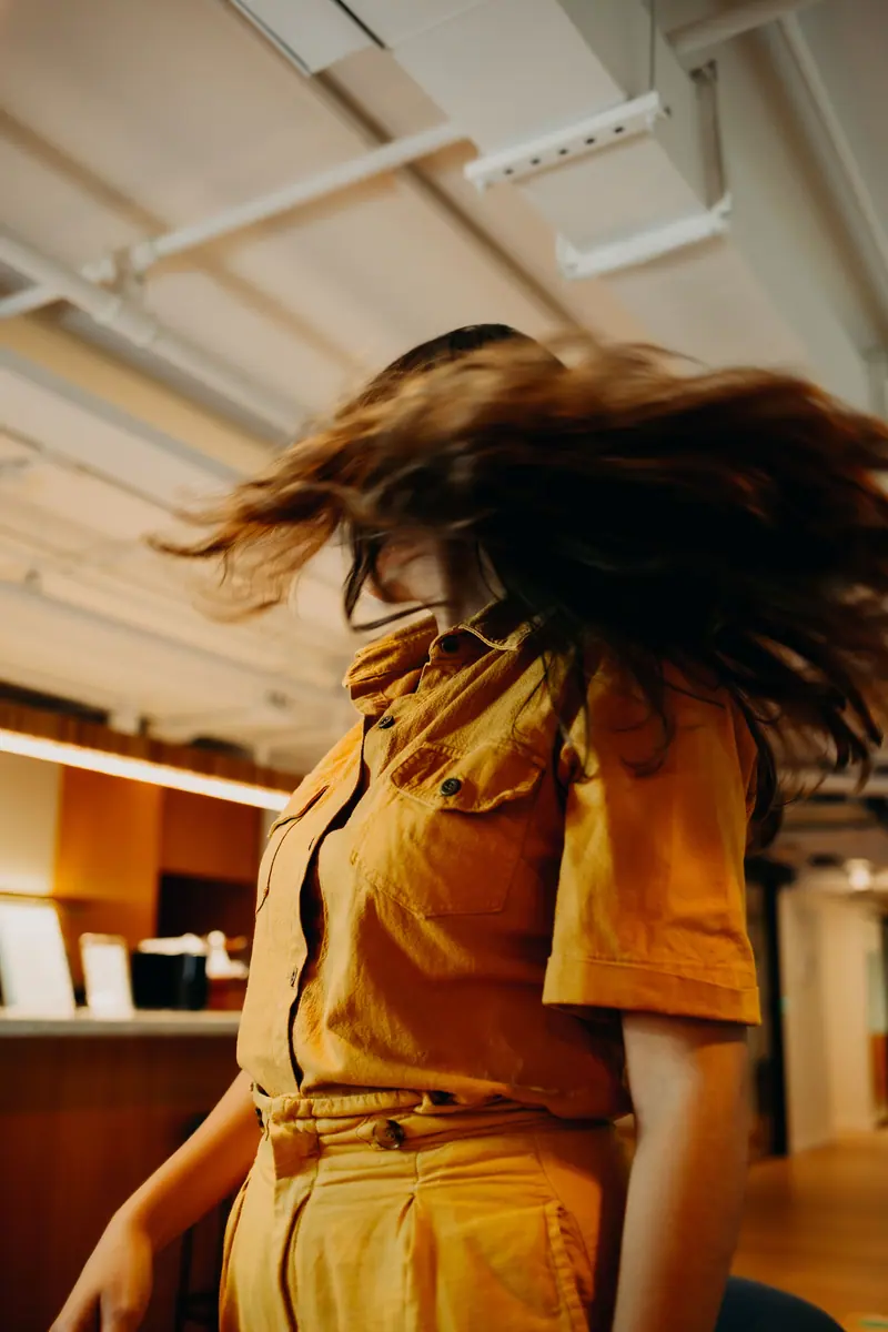 Hair flying mid-dance