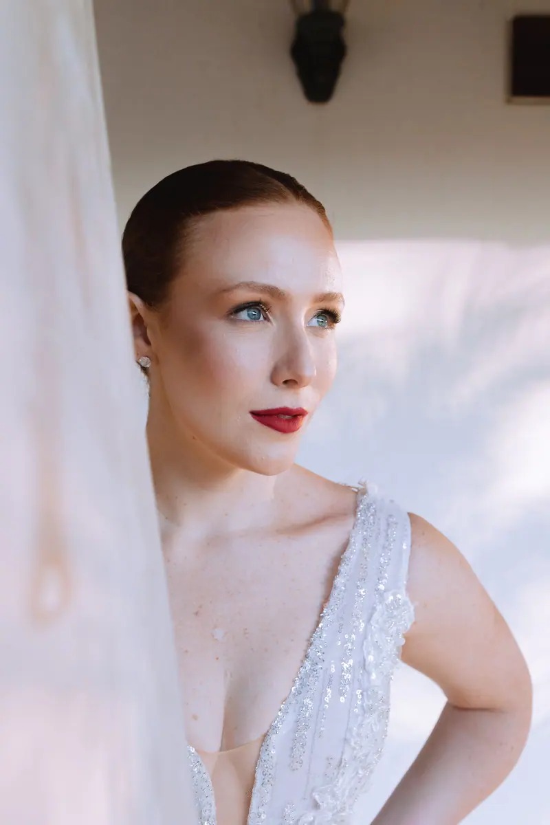 Stunning portrait of a bride in a sequin-embellished white dress, exuding elegance.