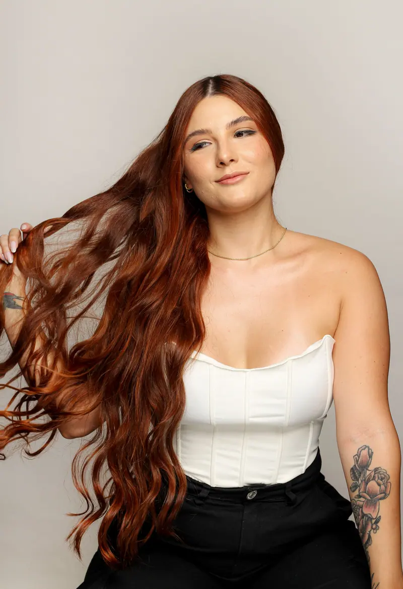 Waist-length auburn waves