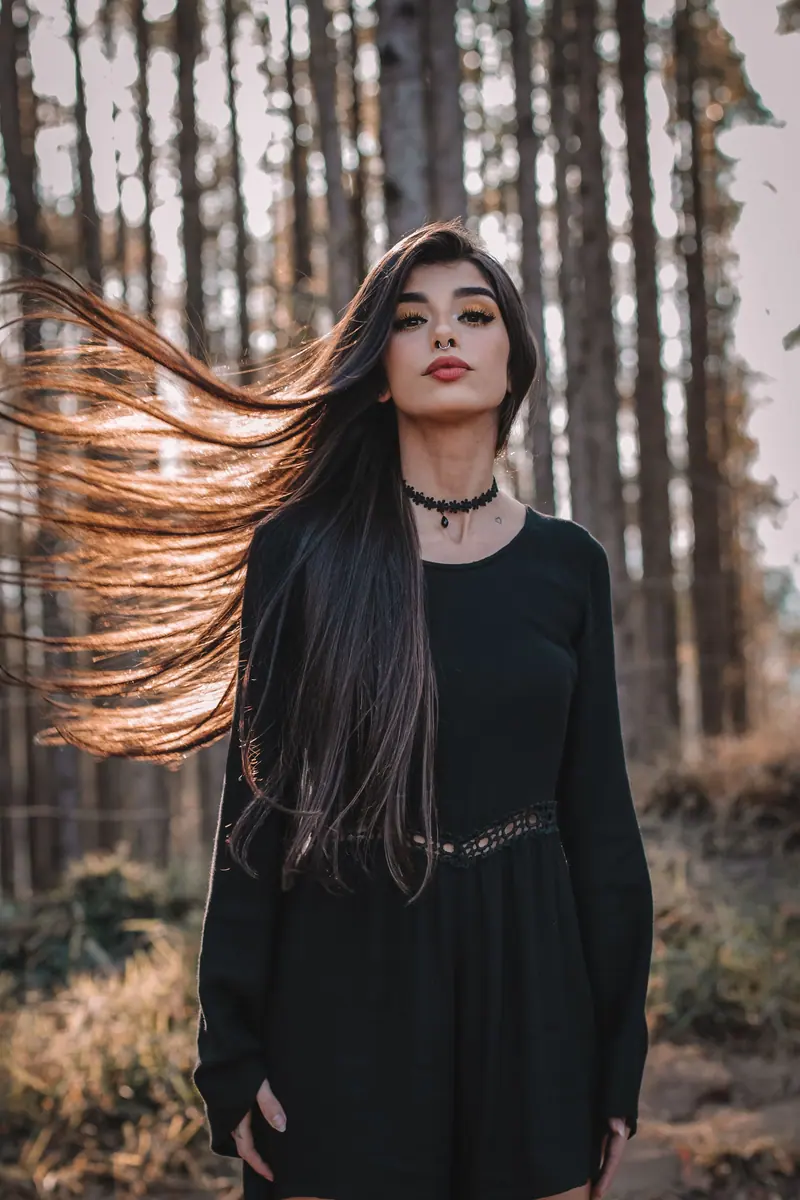 Very long hair among trees