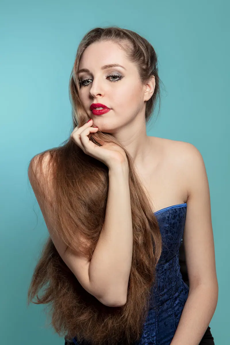 Long waves with a corset top on teal