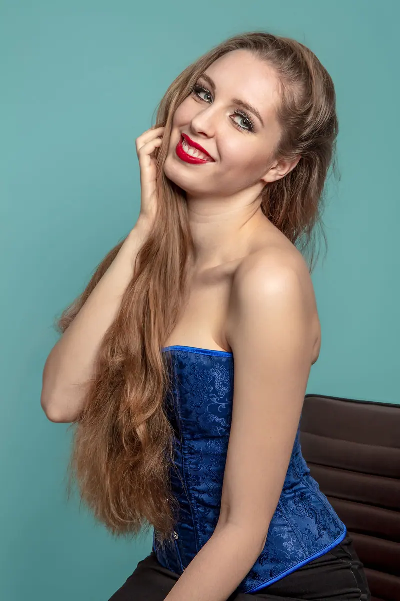 Long hair with a blue corset