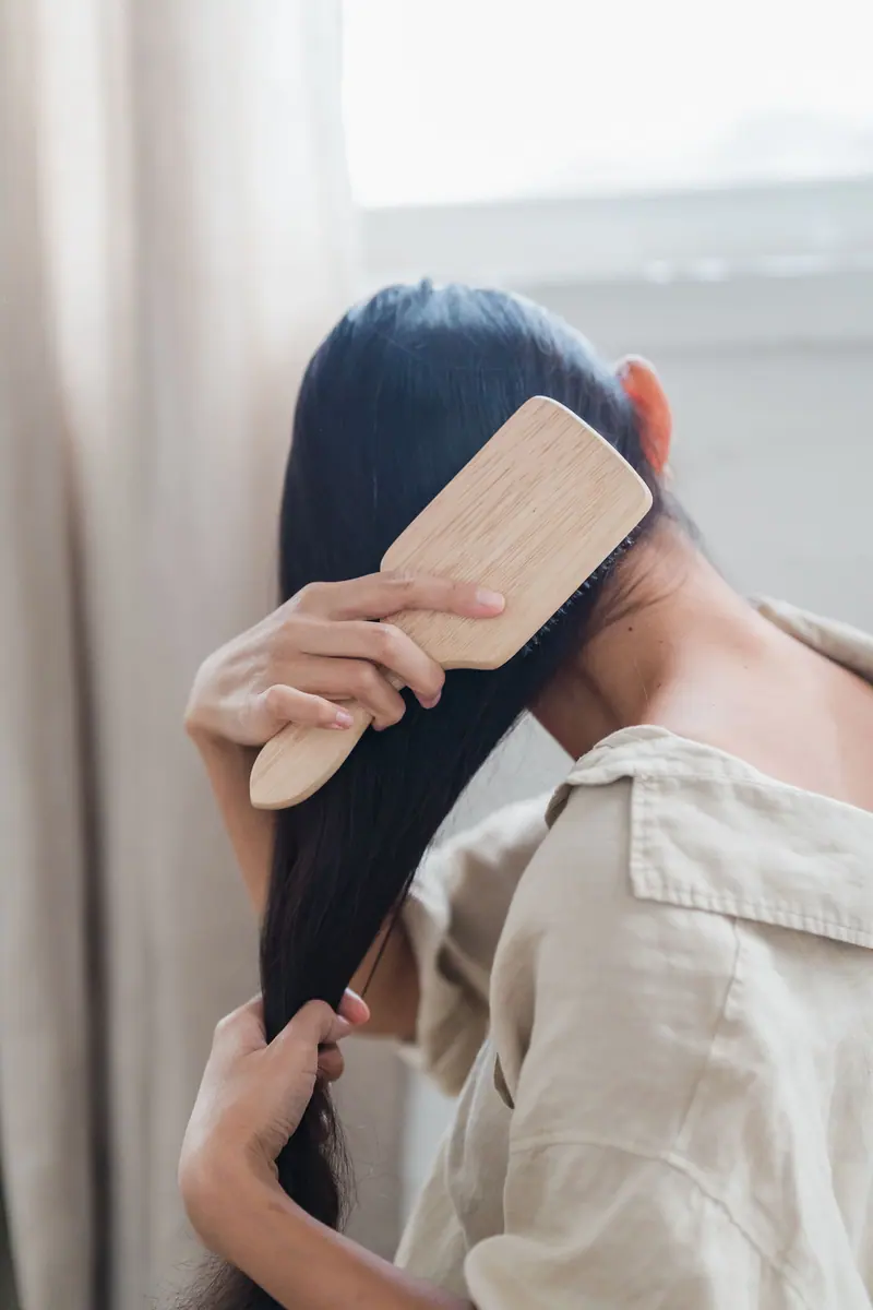 Brushing very long dark hair