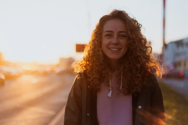 Copper curls in sunset light