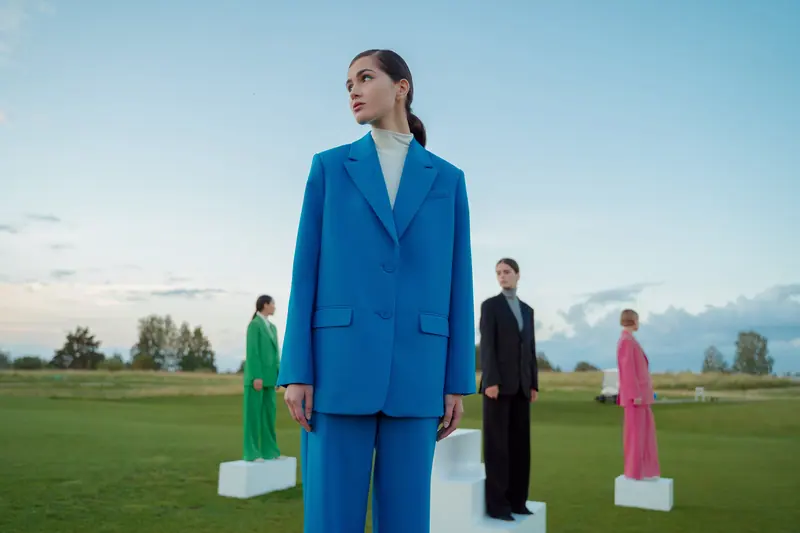 Cobalt suit in a green field