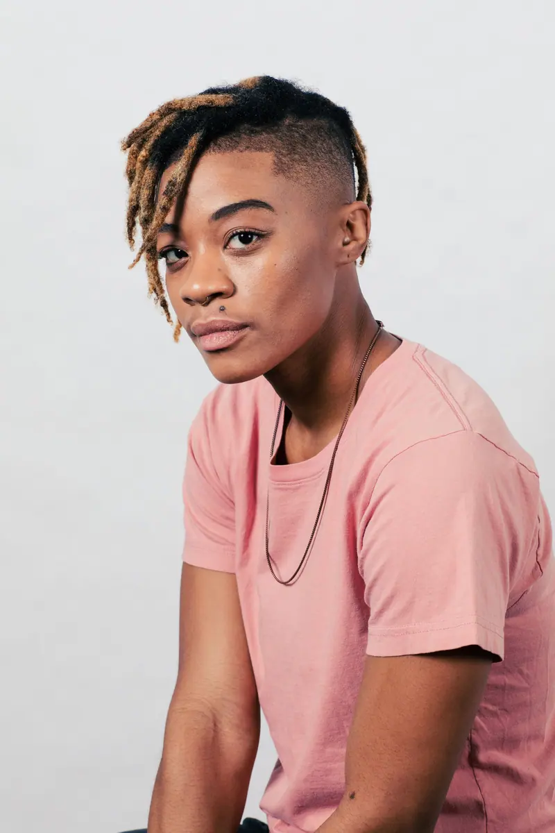 Short locs with a shaved undercut