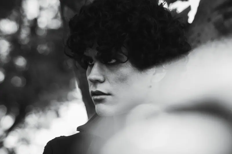 Black-and-white curls in shadow