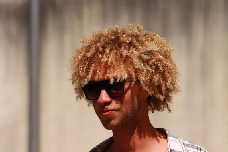 Bleached curls and sunglasses