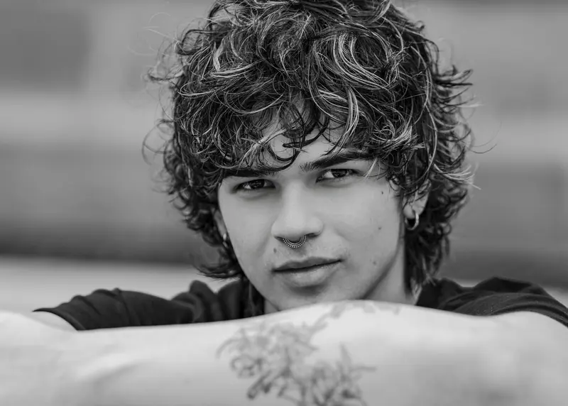 Black-and-white portrait of tousled curls
