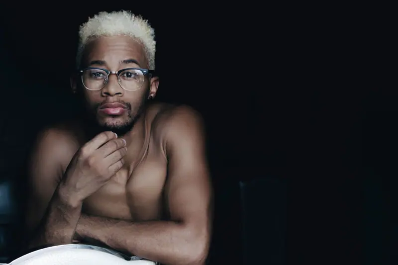 Bleached crop and glasses in low light