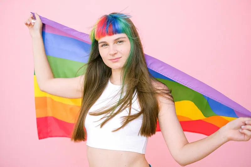 Rainbow bangs and a pride flag