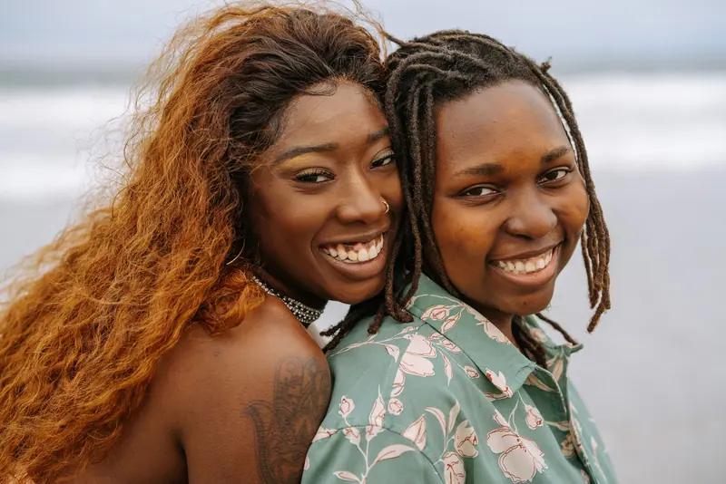 Couple laughing on the beach