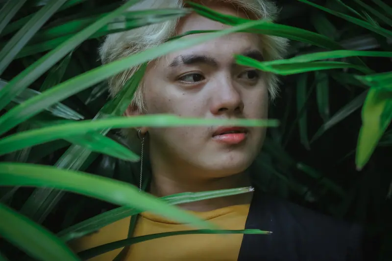 Platinum hair among leaves
