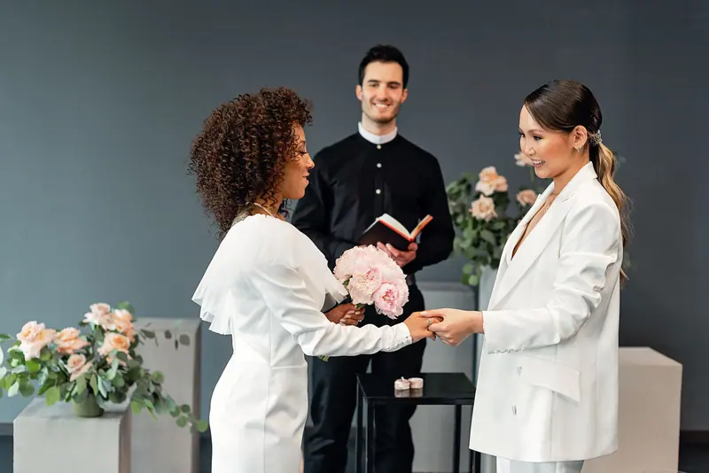 Two brides exchanging vows