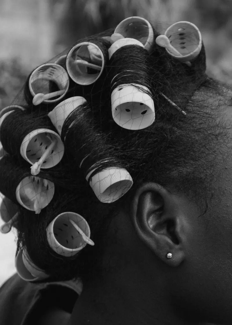 Black-and-white rollers on natural hair