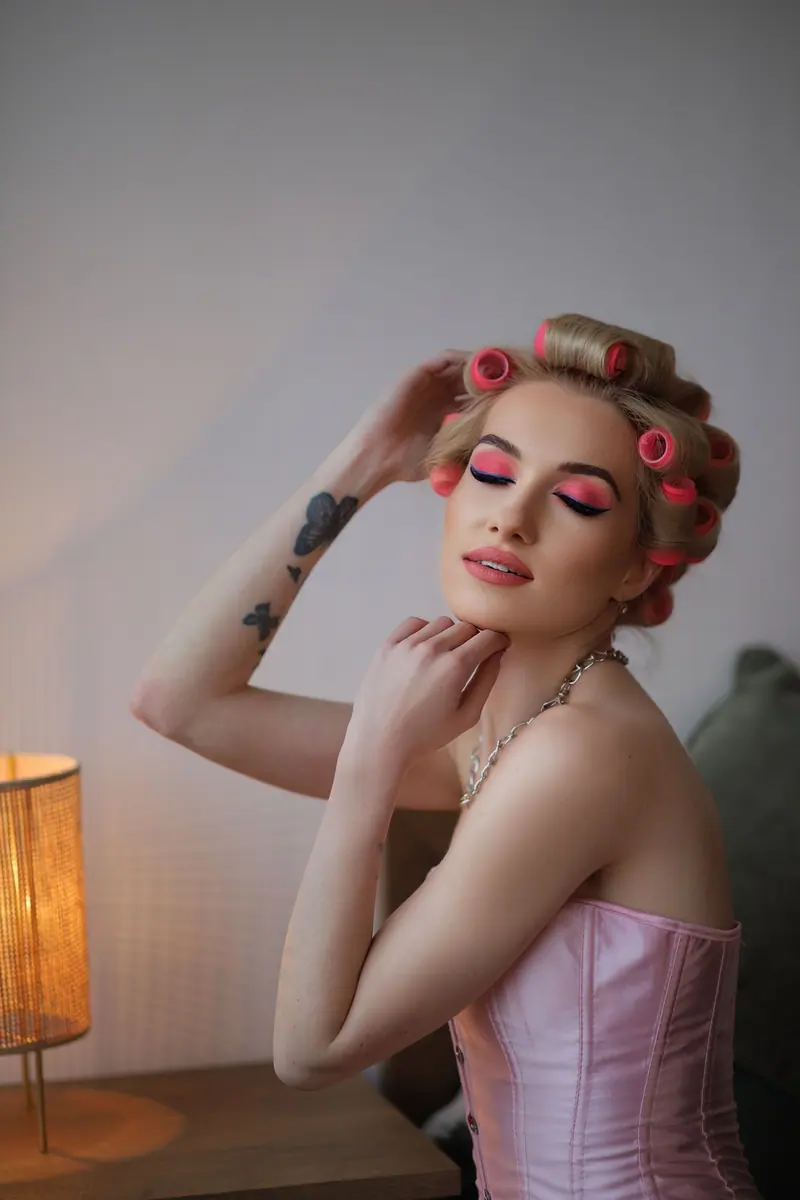Pink rollers and a pink corset