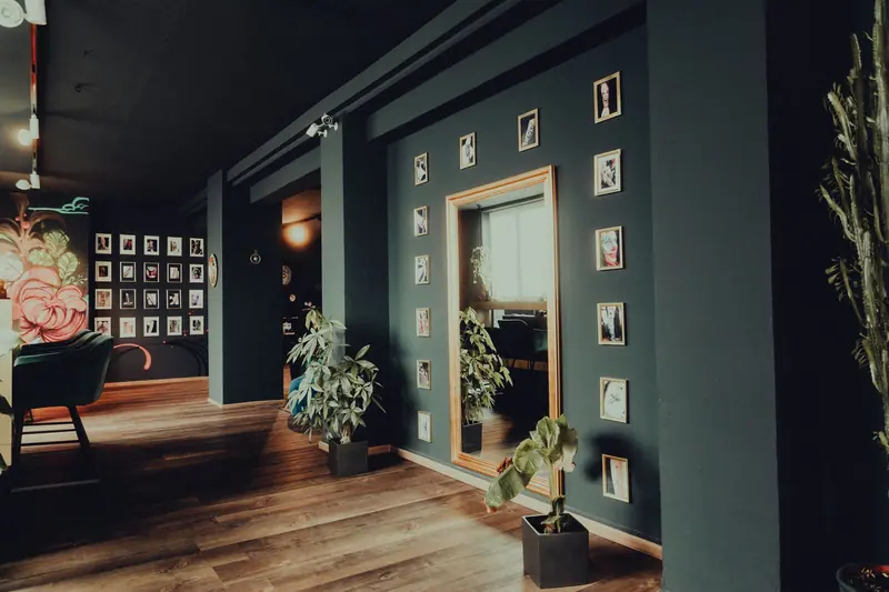 Modern tattoo studio interior in Keltern, Germany, featuring unique artwork and decor.