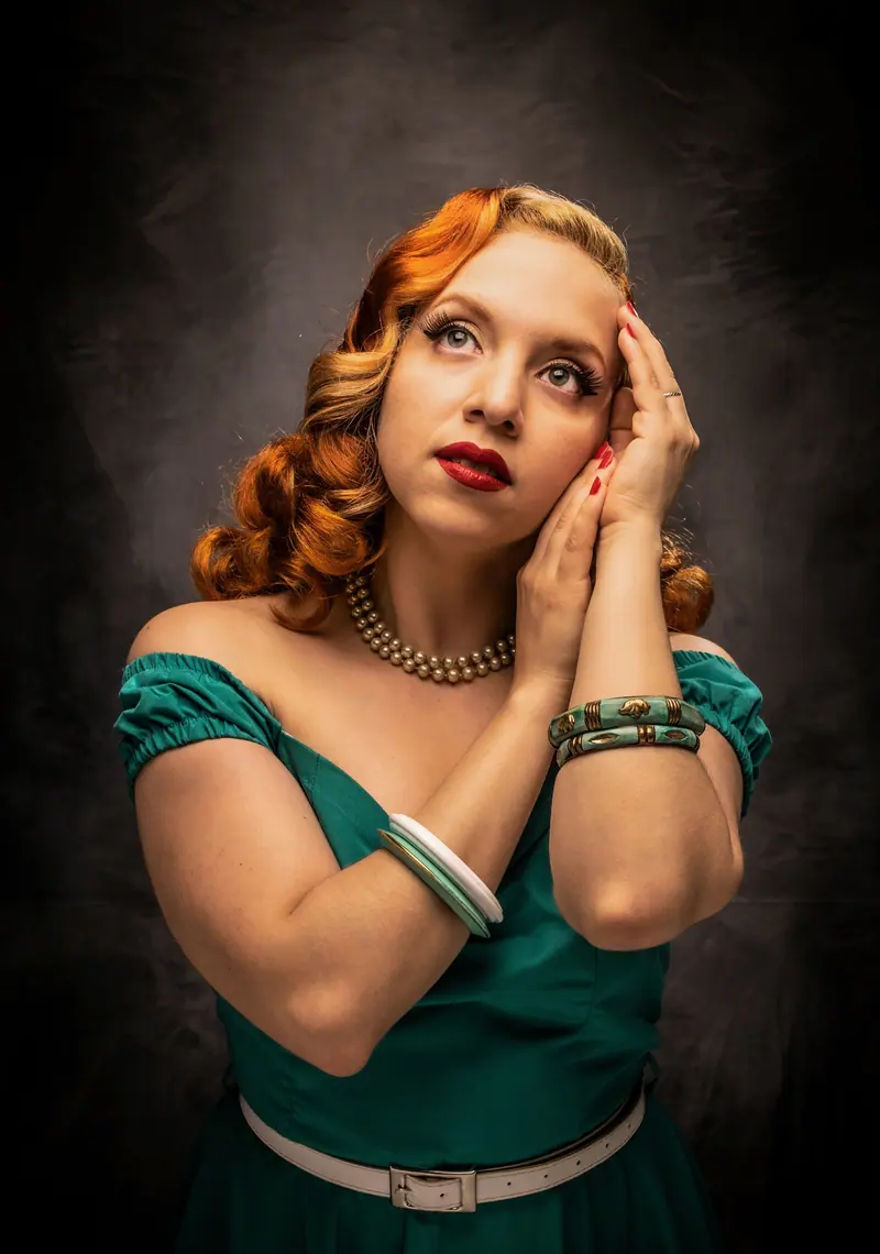 Copper victory waves and a green dress