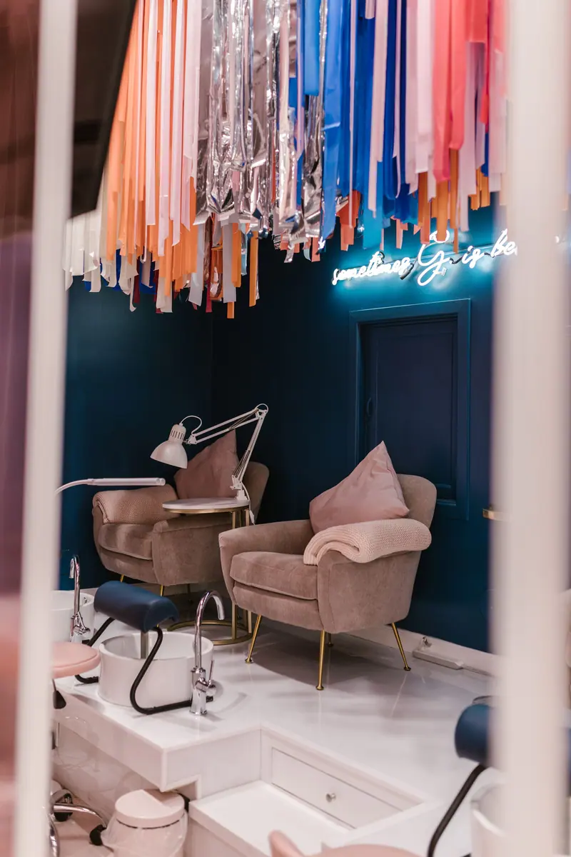Armchairs under hanging decorations