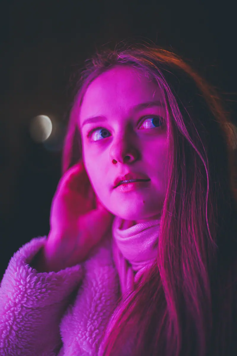 Long hair under violet neon