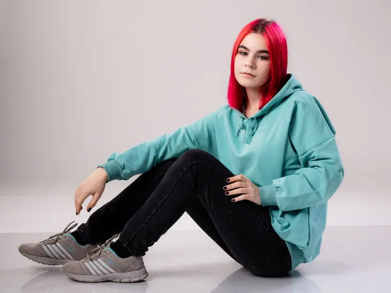 Raspberry lob and a mint hoodie on white