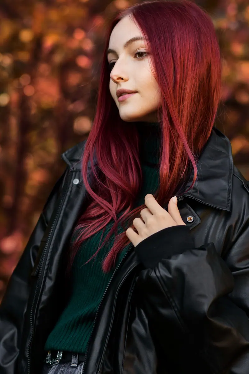 Red hair and a black leather jacket