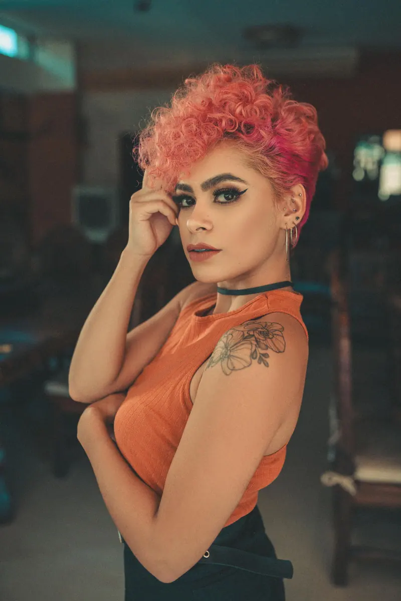 Pink curls and tattoos