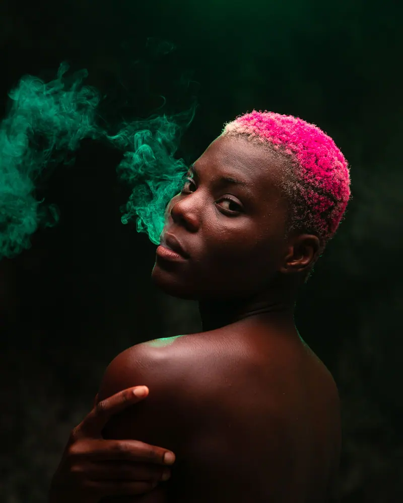Hot-pink crop and green smoke