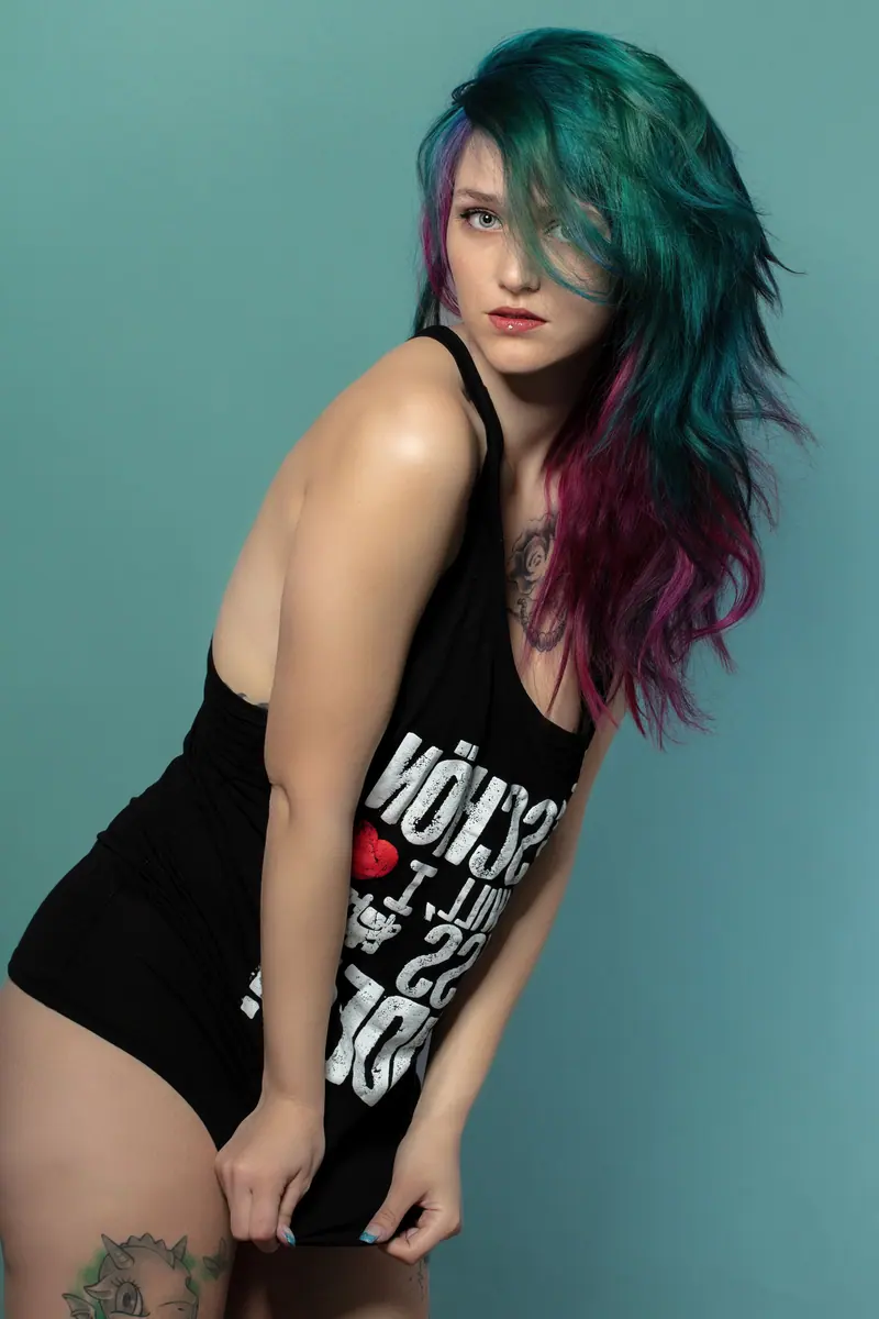 Teal hair fading to plum ends