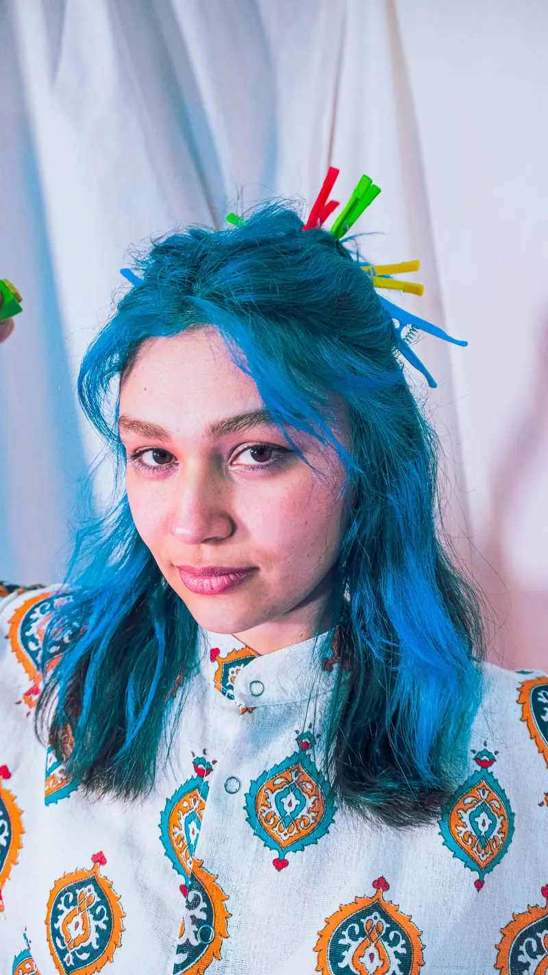 Bright blue shag with colorful clips