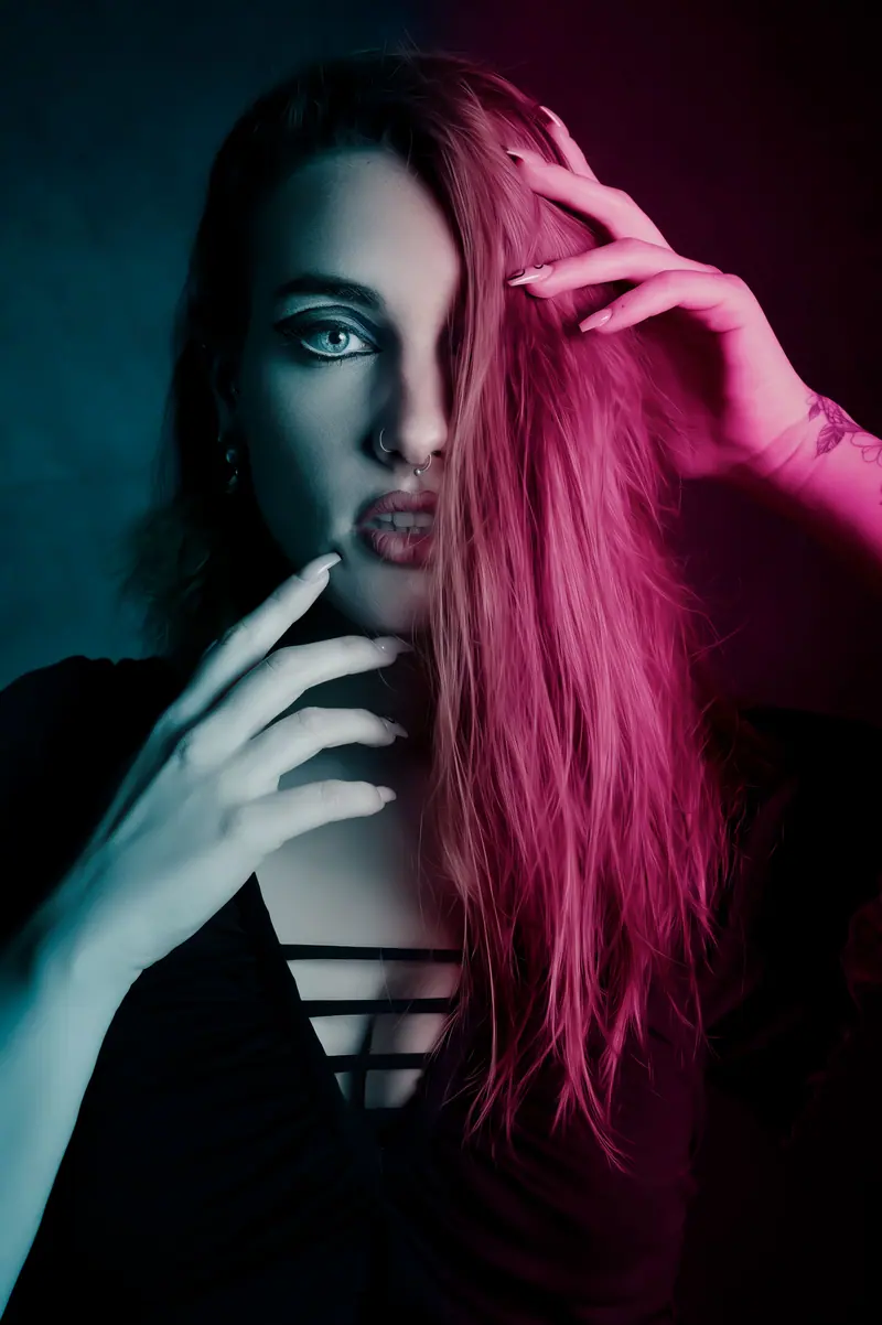 Long pink waves in dark teal light