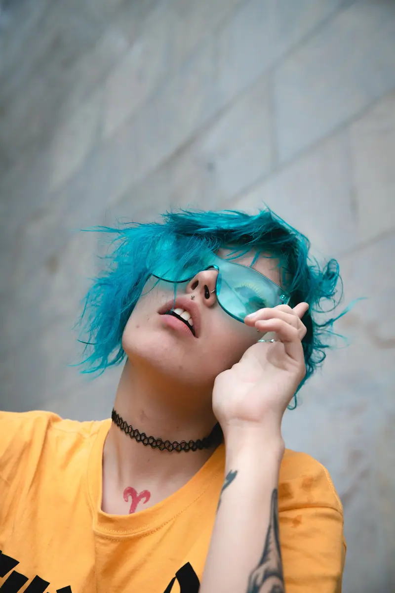 Electric blue hair and sunglasses
